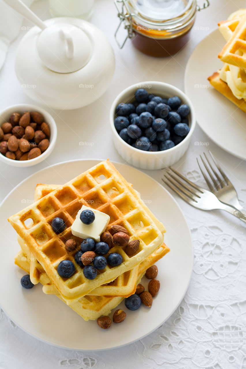 Belgian waffles with blueberries and nuts