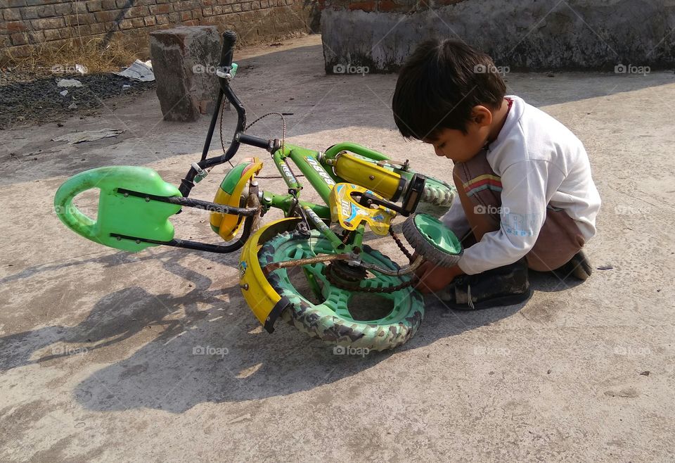 cycle engineer, A child make own cycle so sad.