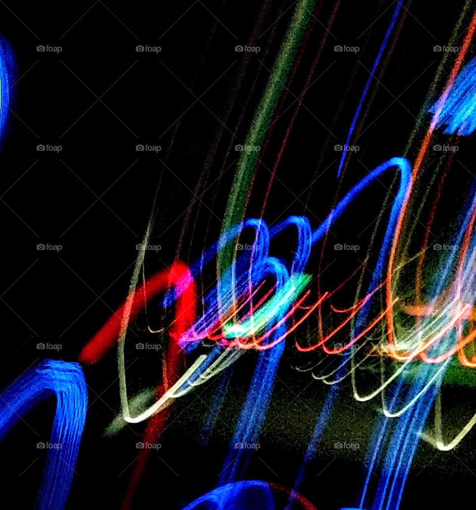 Clash of colors: moving light lines in the dark became an abstract art.