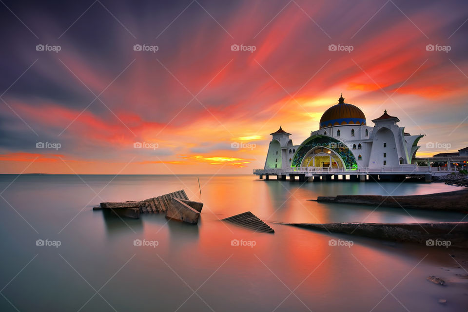 Beautiful long exposure sunset over Malacca Straits Mosque, Malaysia