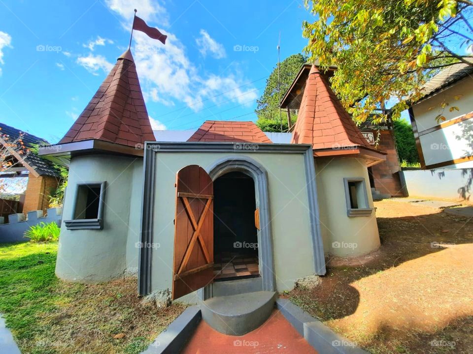A magical castle in the middle of the blue sky.