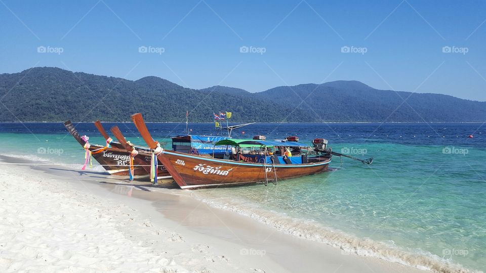 Colorful long tail boats