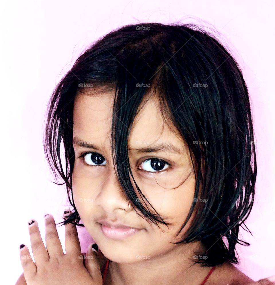 extraordinary photography close-up looking at camera black hair beautiful eyes photogenic background hand new style bengali kolkata model girl business