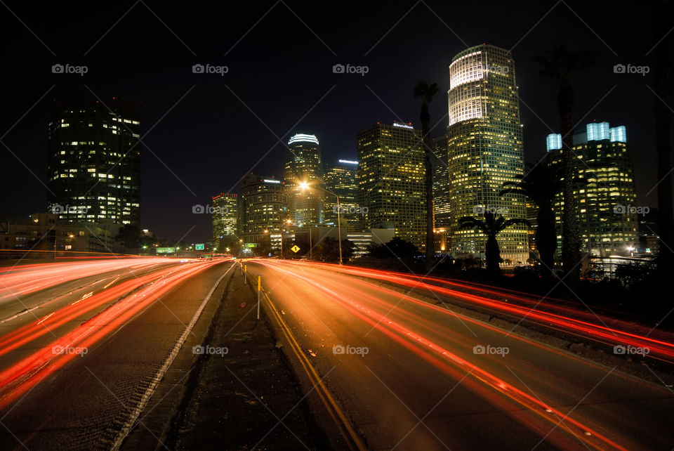 City time lapse and exposure, night time skyline from highway