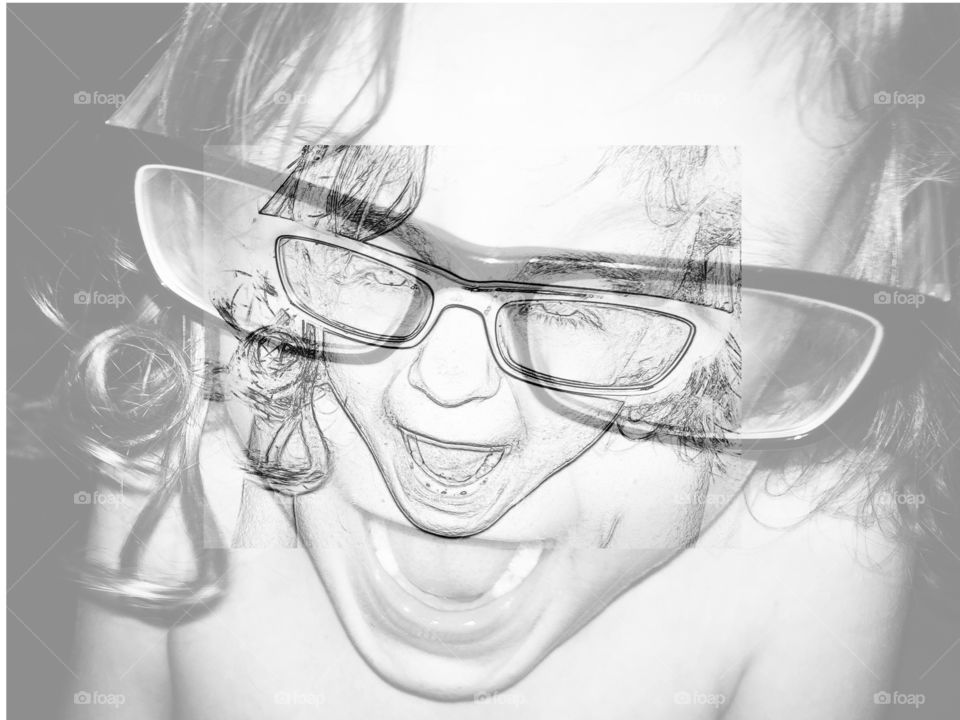 Multi exposure of a child wearing eye glasses and shouting