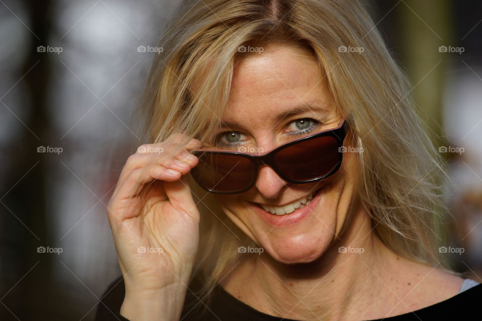 portrait of a women with sunglasses