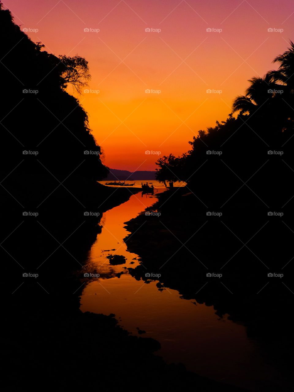 Sunset over a river bed in Thailand 