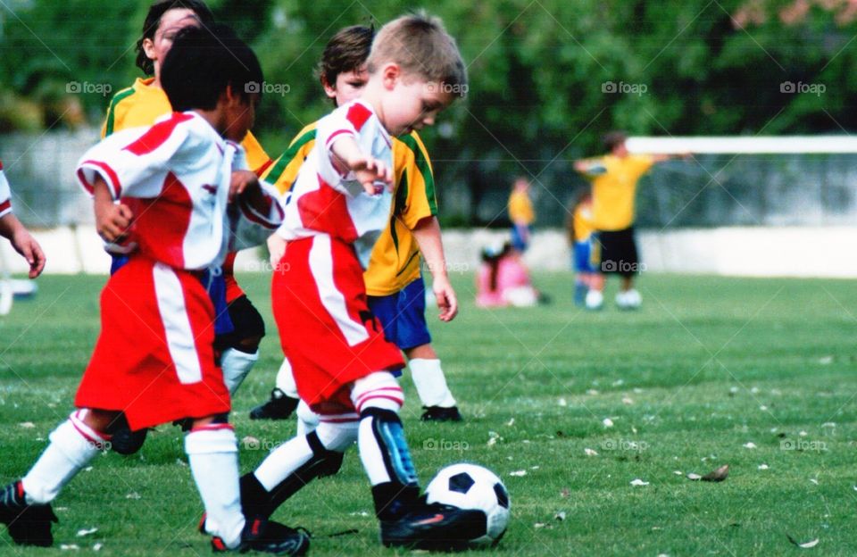 Boy playing soccer