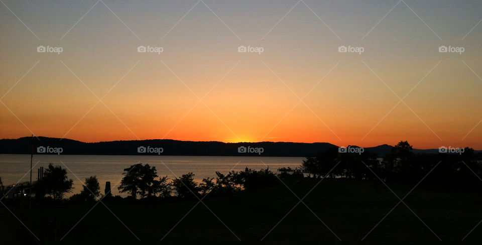 sunset river mountains silhouette by delvec