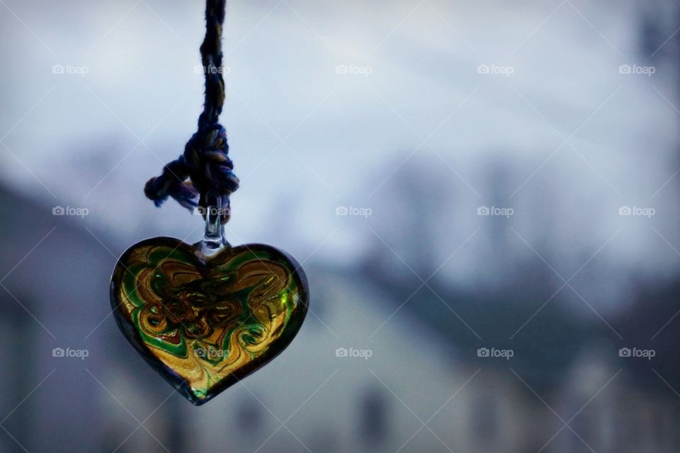 Glass heart necklace hanging