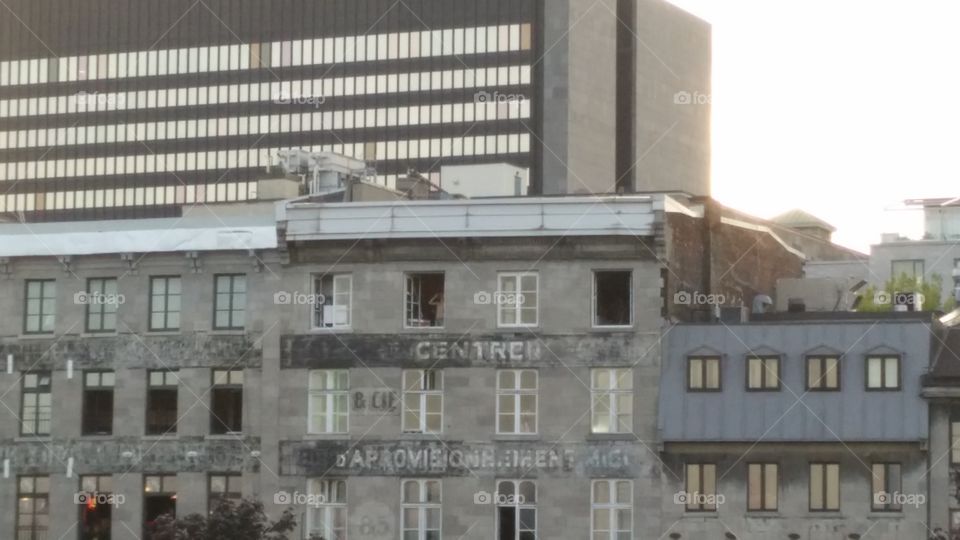 guy taking pictures from his window