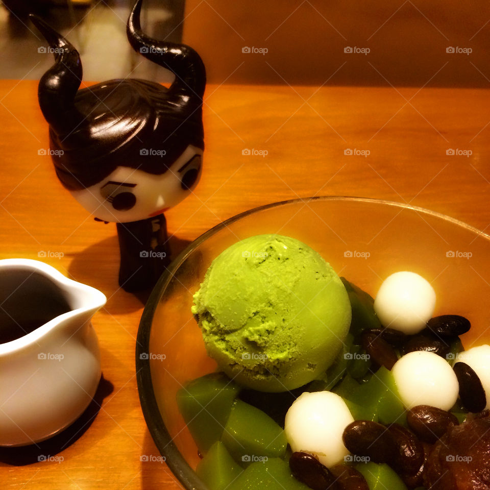Maleficent with green tea dessert