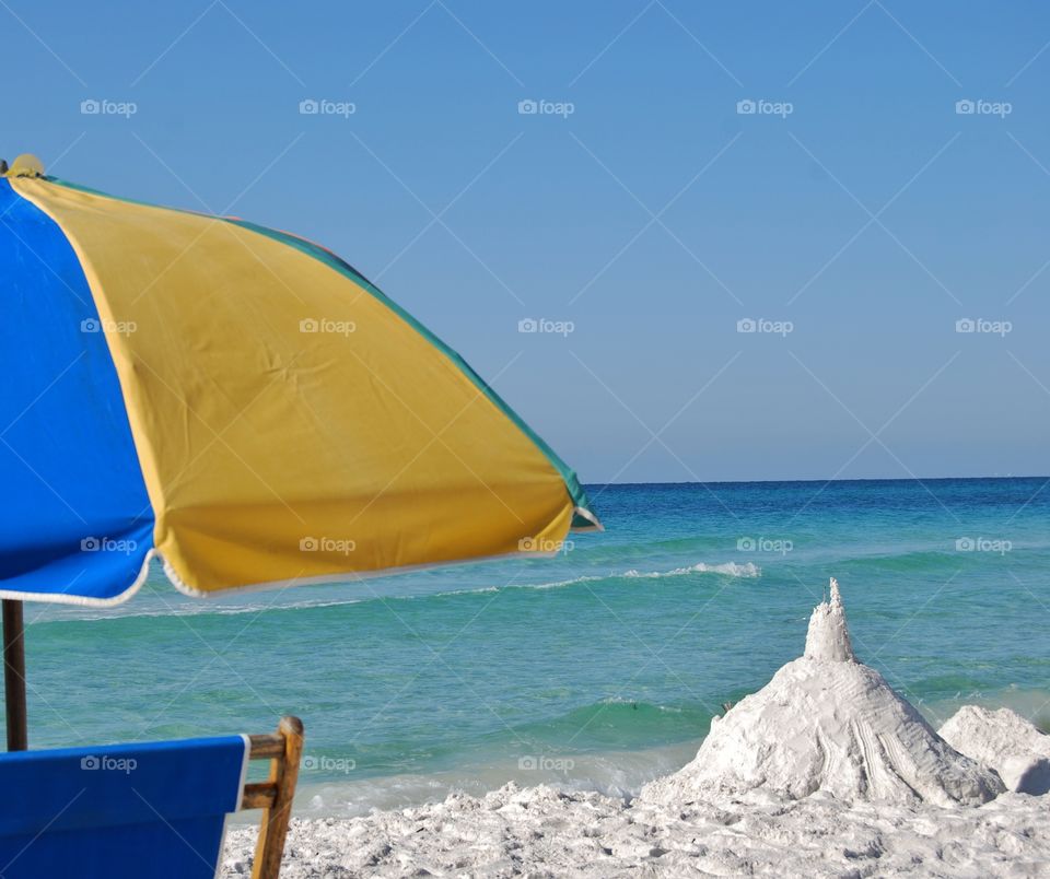 Umbrella at the beach. Relaxing at the beach