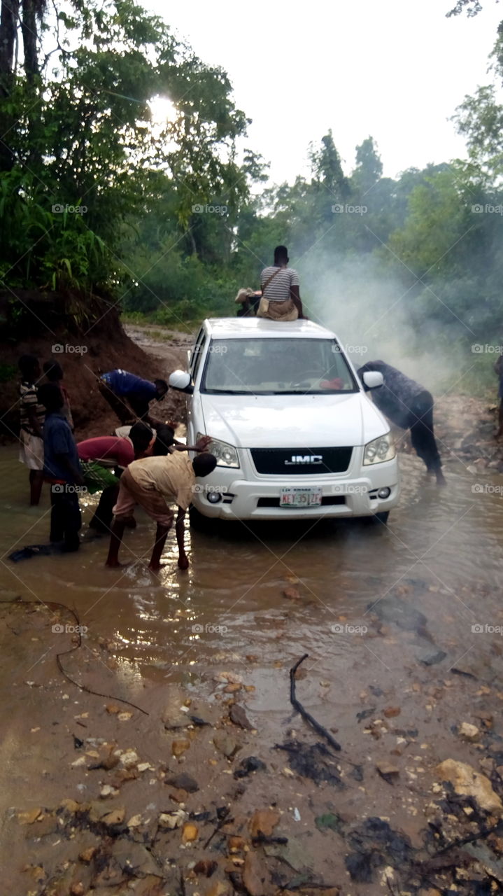 washing car with stream water and smokes appears