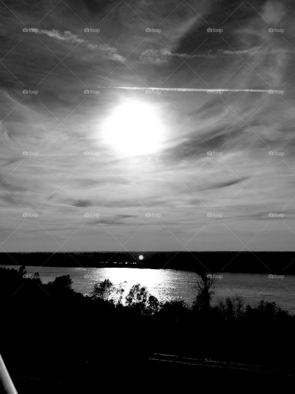 Black & White sunshine reflection of the river.