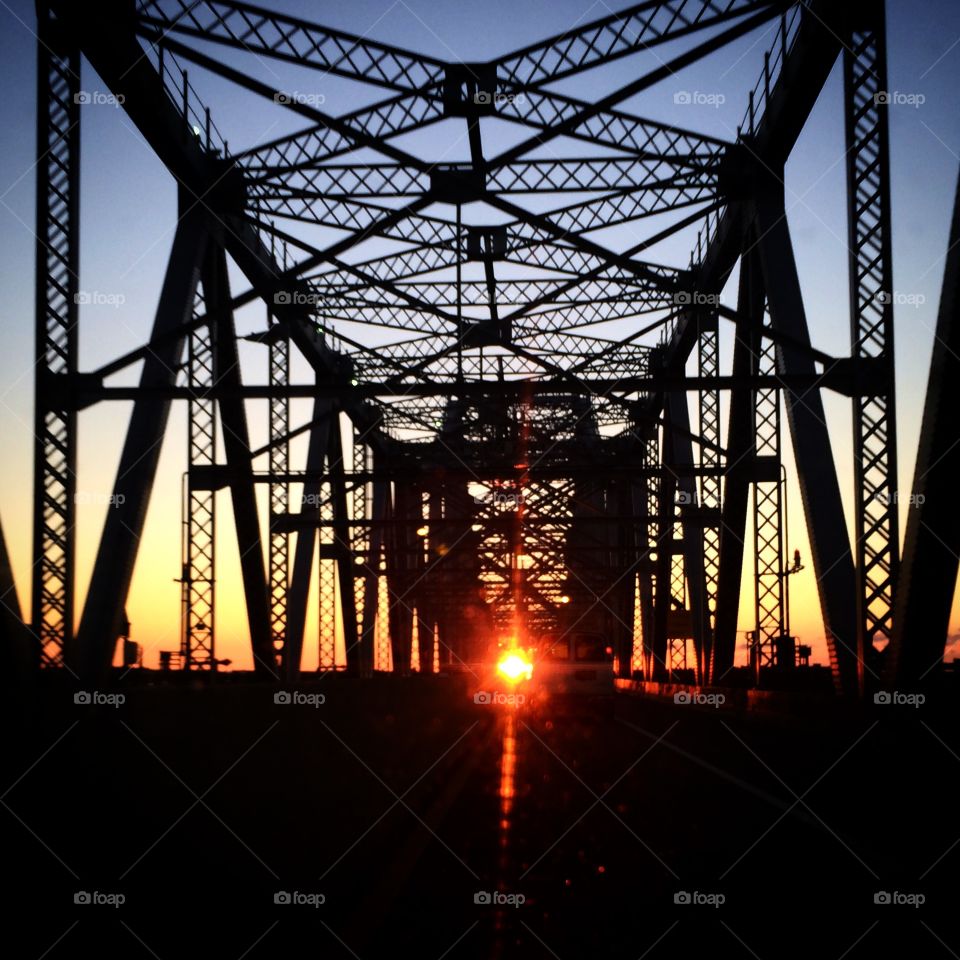 Sunrise Bridge . Sun rising through a bridge 