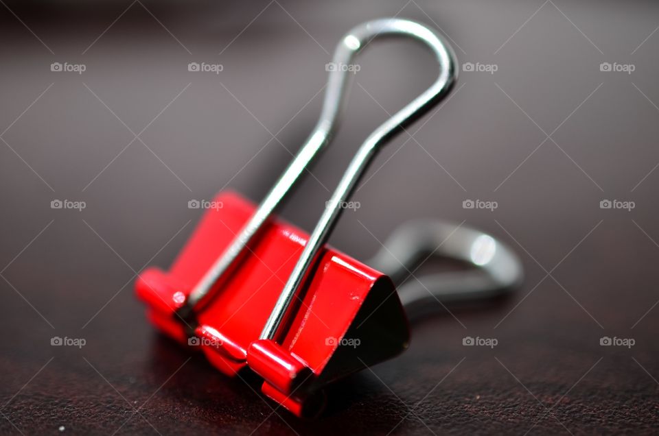 Close-up of red binder clip