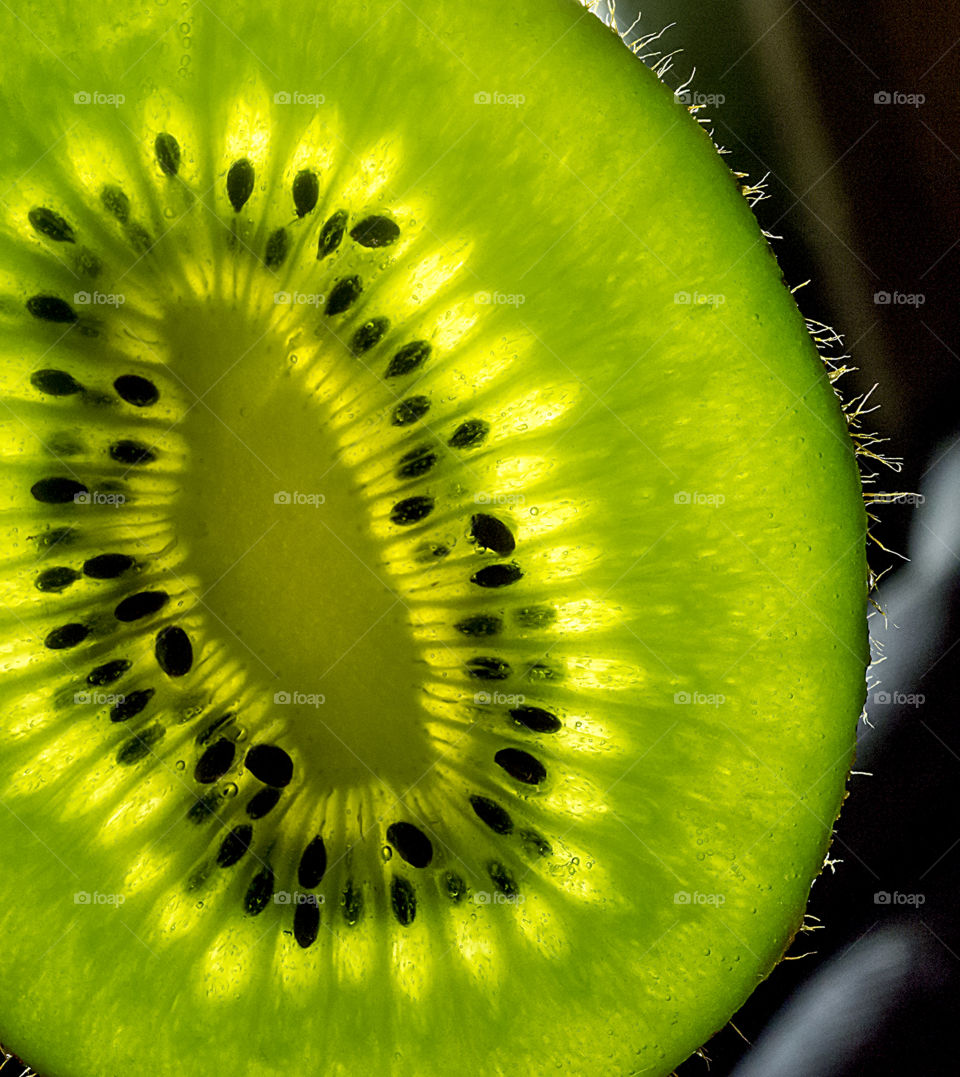 Kiwi. Green fruit. Seeds. Macro.