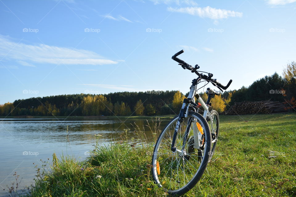 bike on a lake shore beautiful autumn landscape