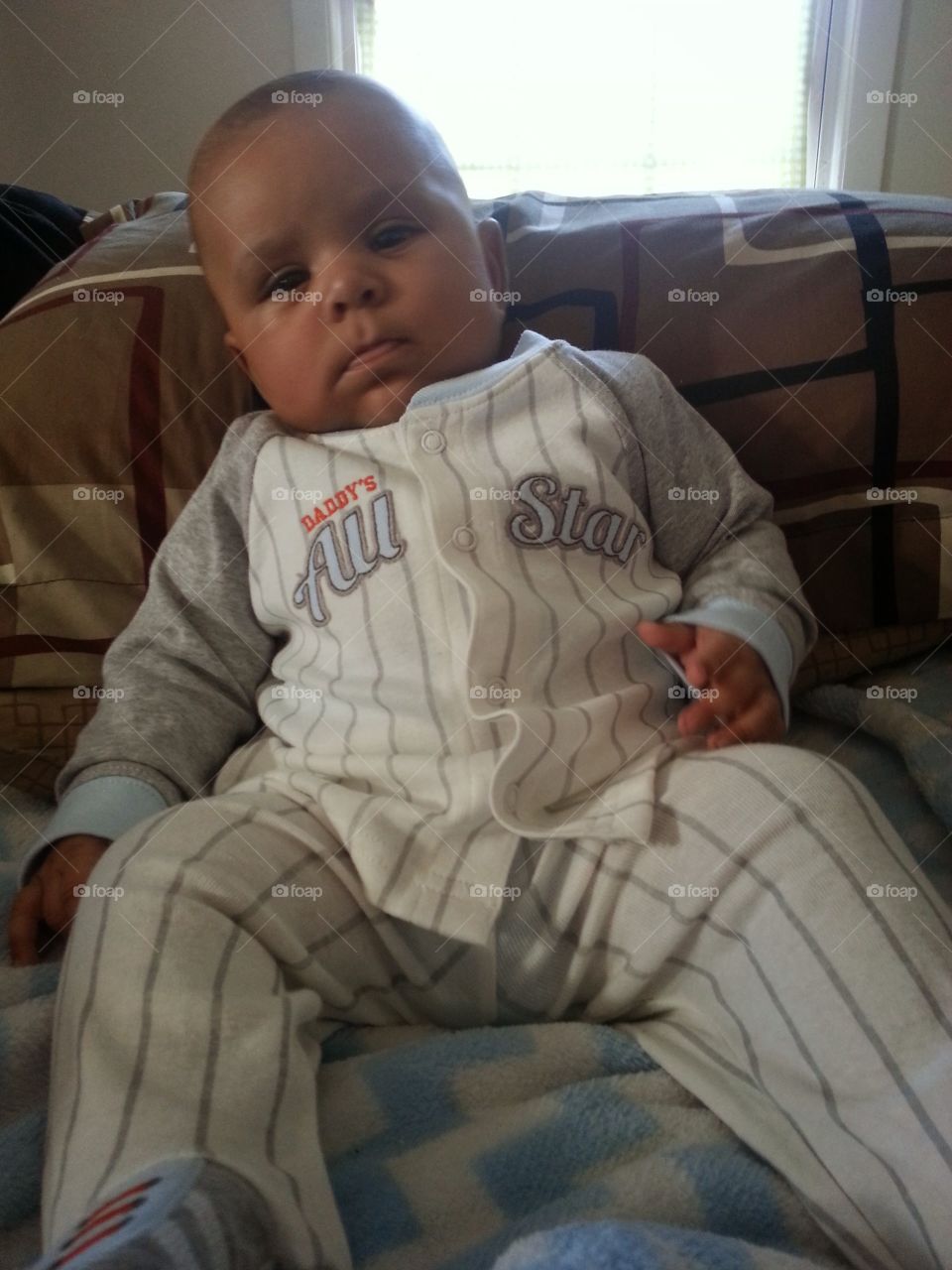 All Star. my son siting up like he is grown