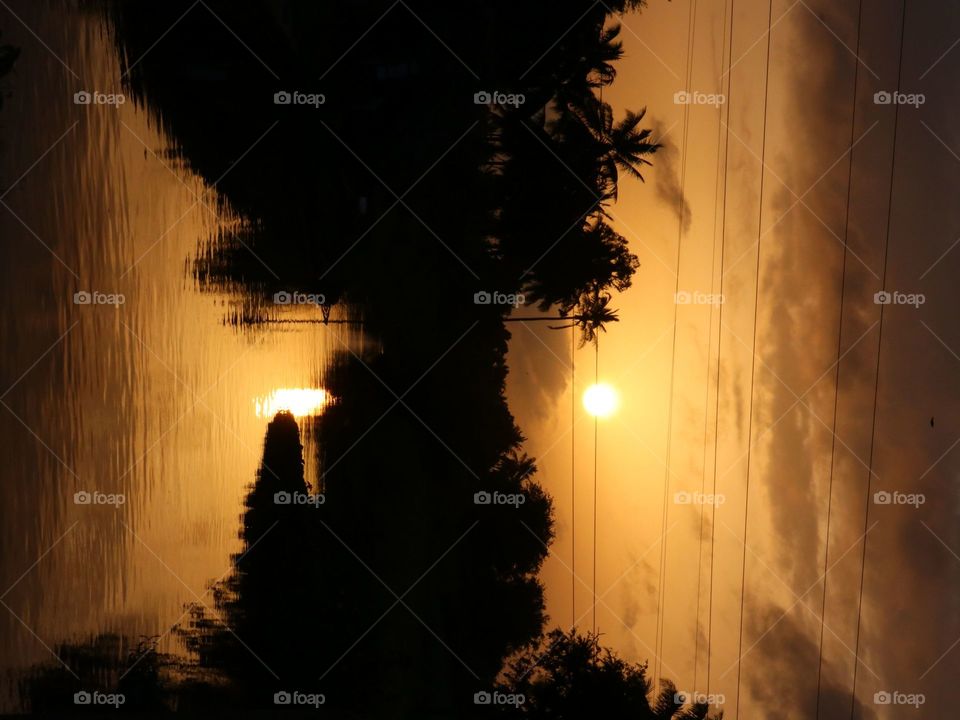 sunrise reflection water