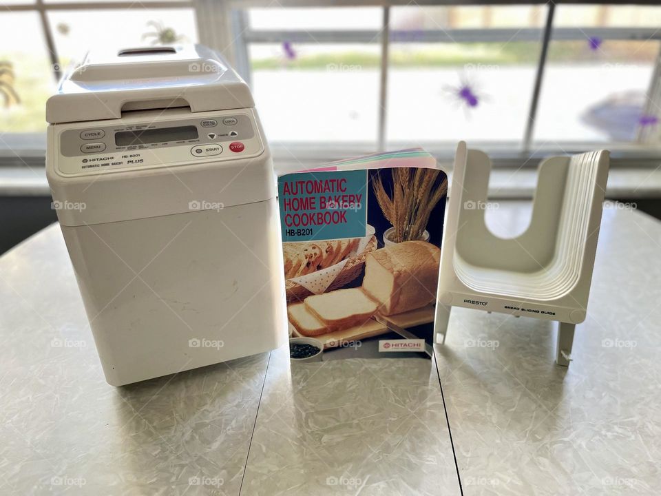 Hitachi bread maker, getting ready to make bread, bread maker and slicer, making bread at home, making homemade bread, making meals at home 