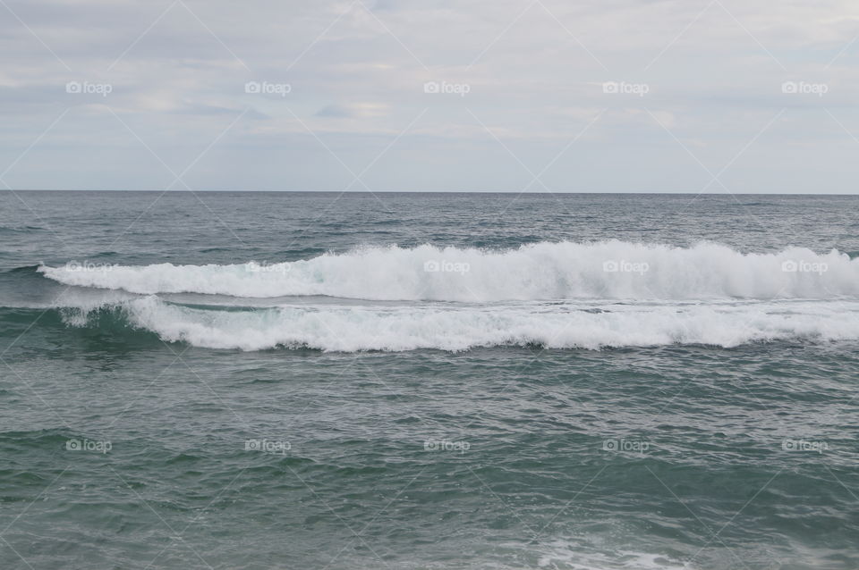 Background. Pequeñas olas en el mar