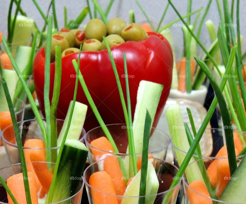 Munching way to health. Fresh vegetables on a display tray 