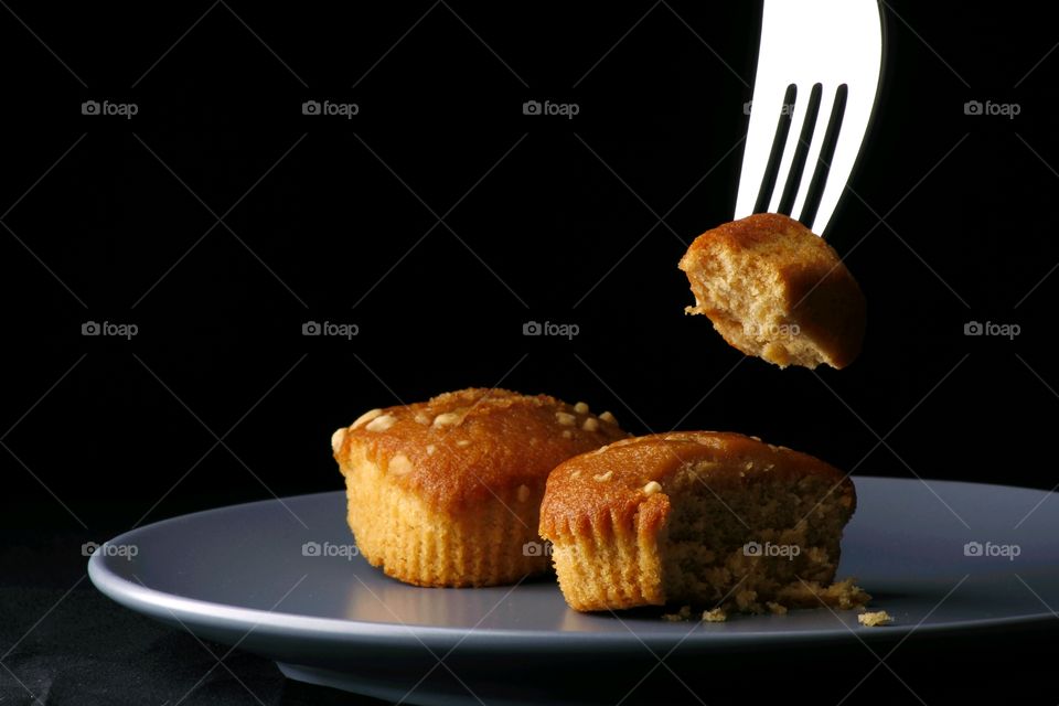 butterscotch bars on a plate and a fork