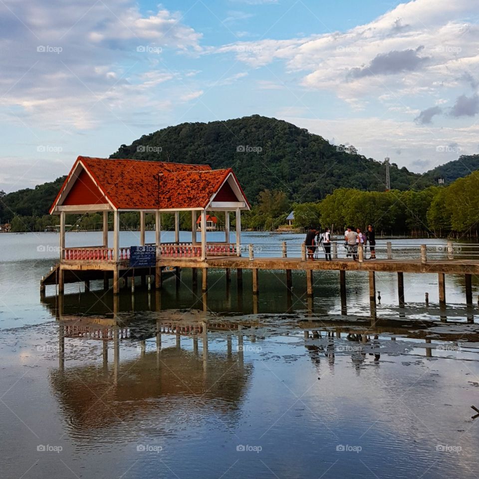 Pavilion over the lake against blue sk