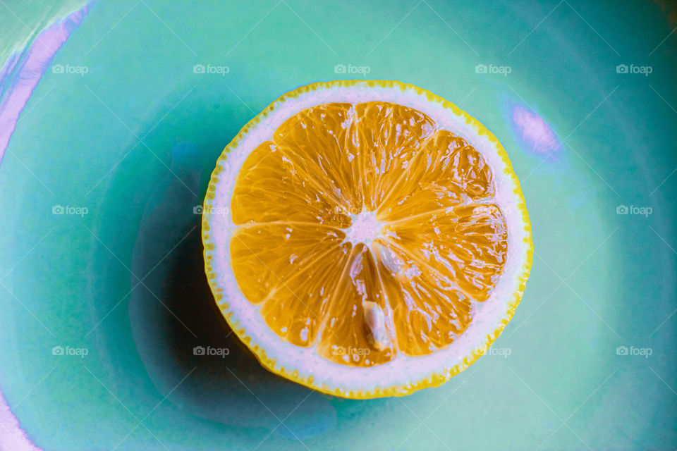 halved lemon on a plate