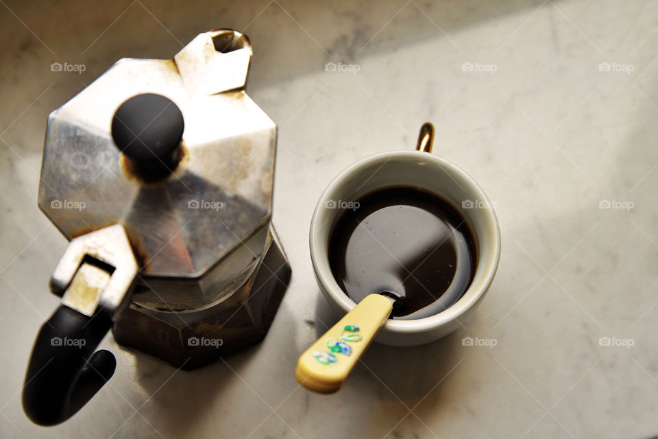 prepare an Italian coffee with old coffee house