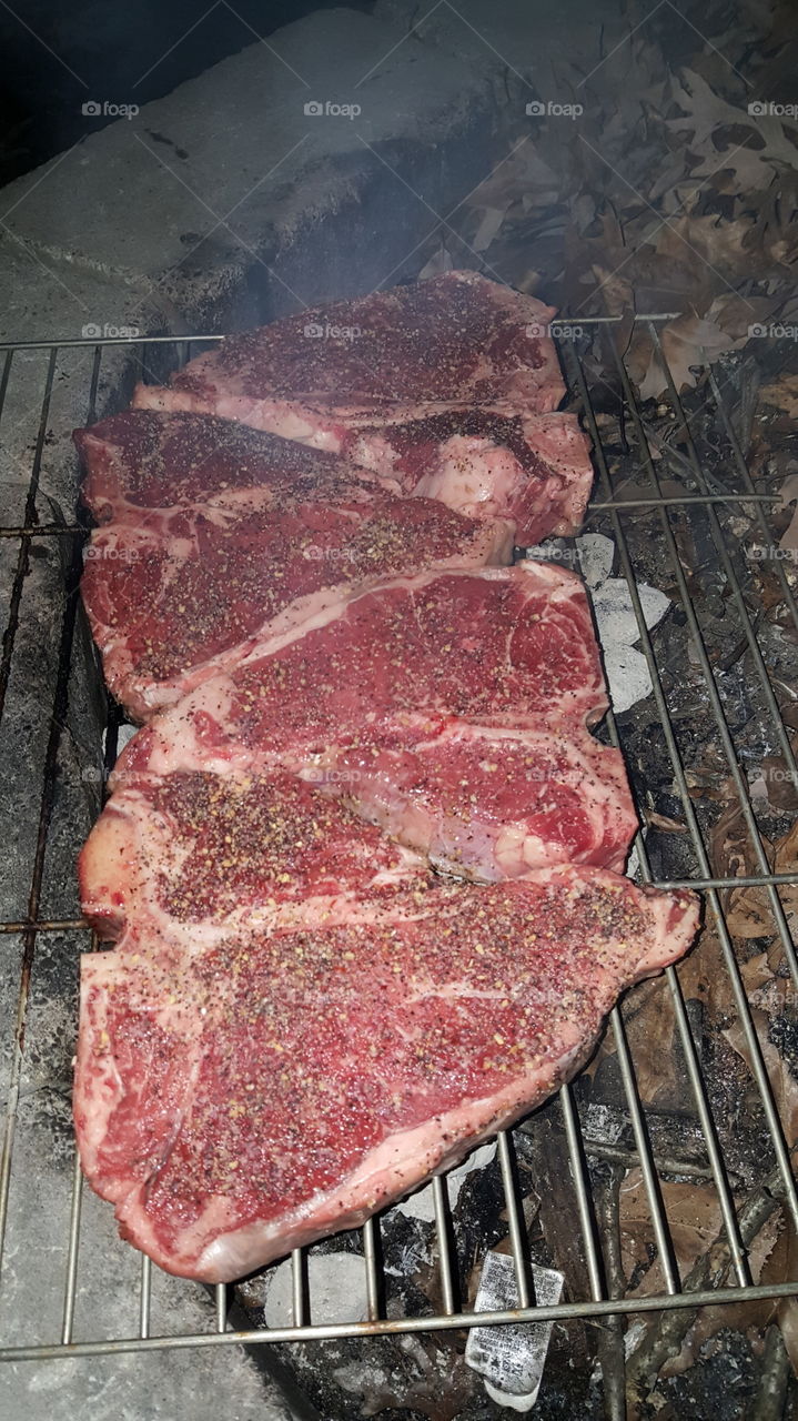 steaks on the open fire