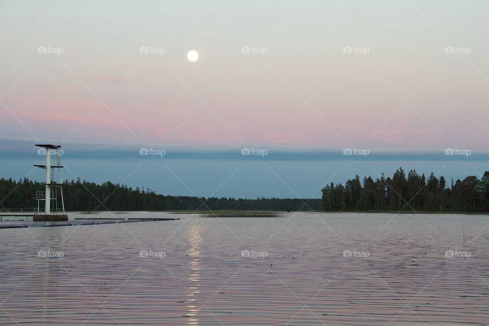 full moon over the water