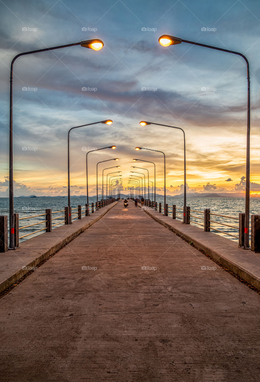 Beautiful twilight scene behind long bridge at Lo Jak port in Koh Yoal Yai Thailand