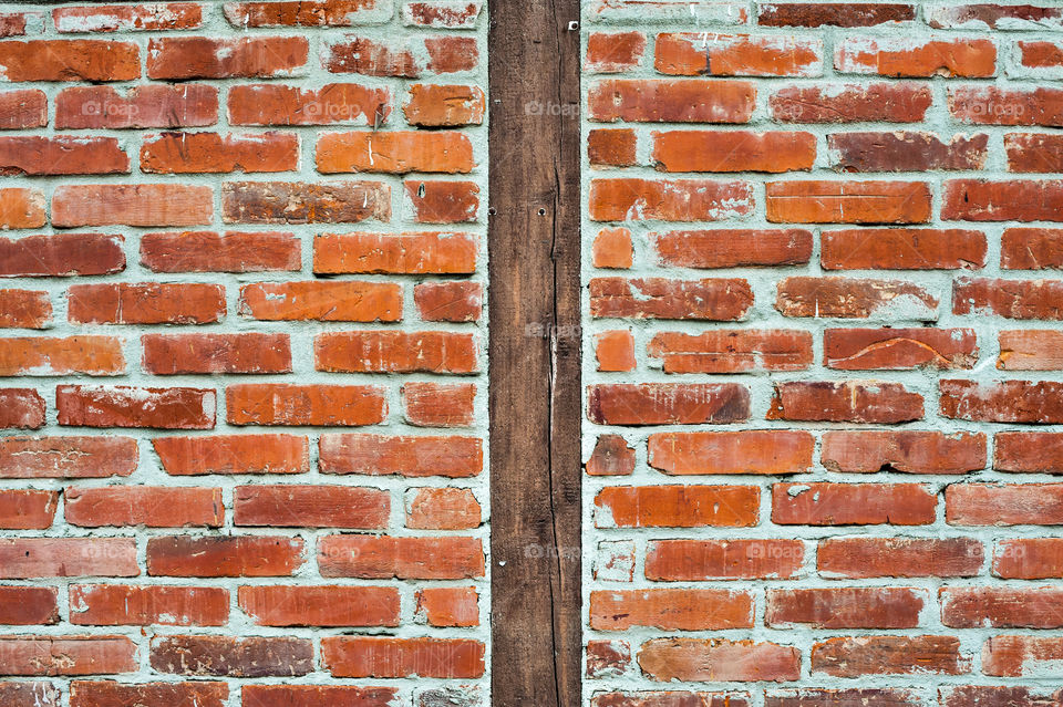 Wall and Wooden Pole