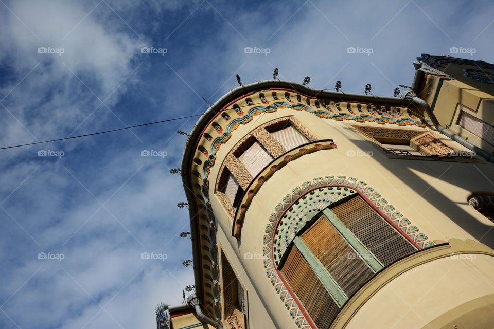 corner of a beautiful building. look up to a corner of a beatiful building dating from beginning of 20th centhury architecture