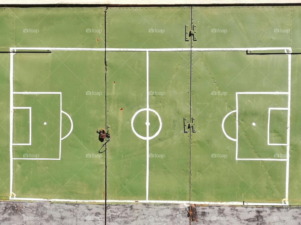 Soccer field designed on an old gate