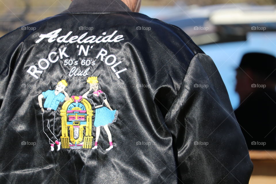 Vintage Rock and roll black leather bomber style jacket, man wearing