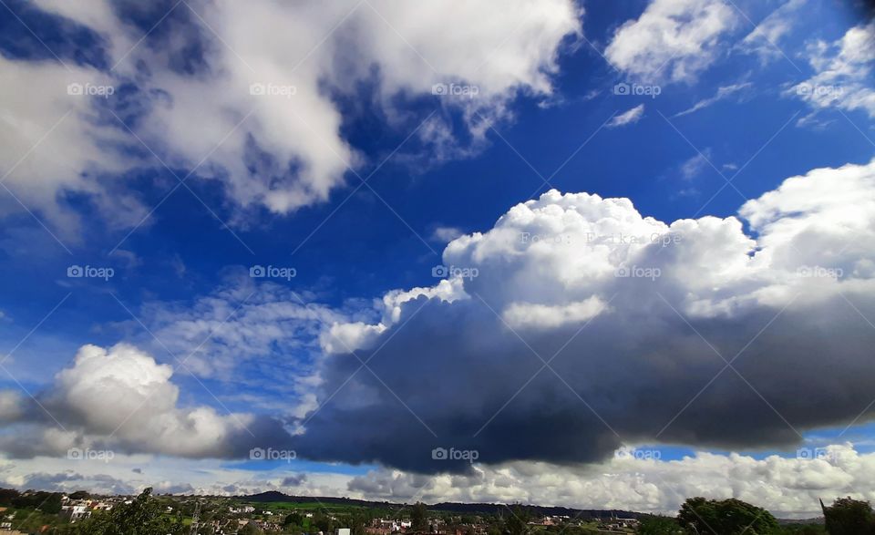 rain clouds in the Village,cloudy, clouds,sky,landscape,nature,colorful,sunset,rain,Village,season