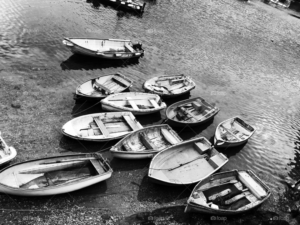 Rowing boats waiting for high tide at Mevagissey. 