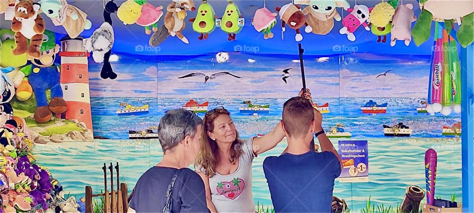 At the “Gäubodenvolksfest”, a yearly carnival that comes to the town of “Straubing”, “Lower Bavaria” in late August there are many fun things to see or do such as this sharp shooting competition for prizes. 2024. Hypnotic Productions