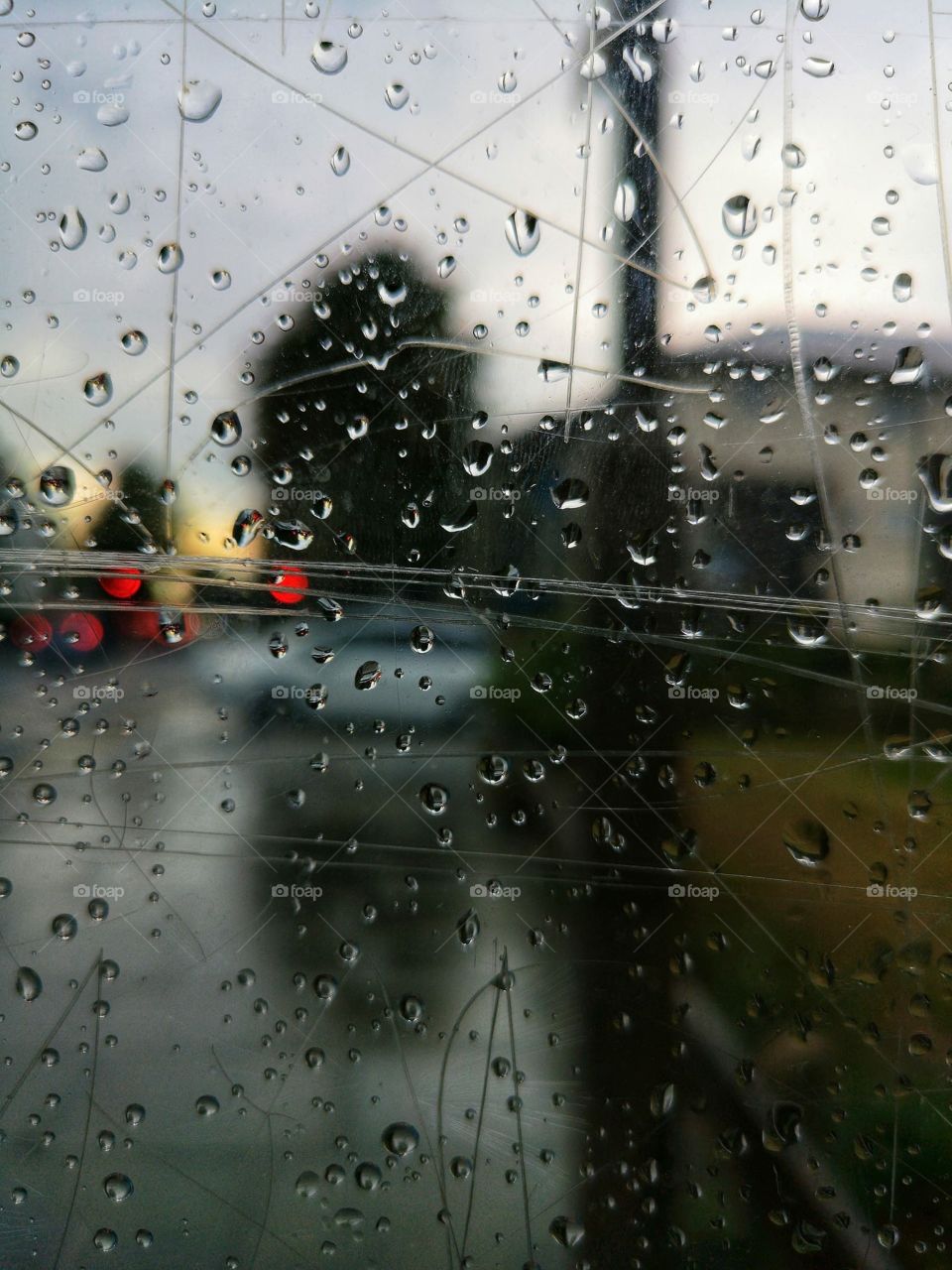 Raindrops on a bus window 