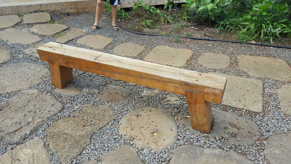single beam of wood bench