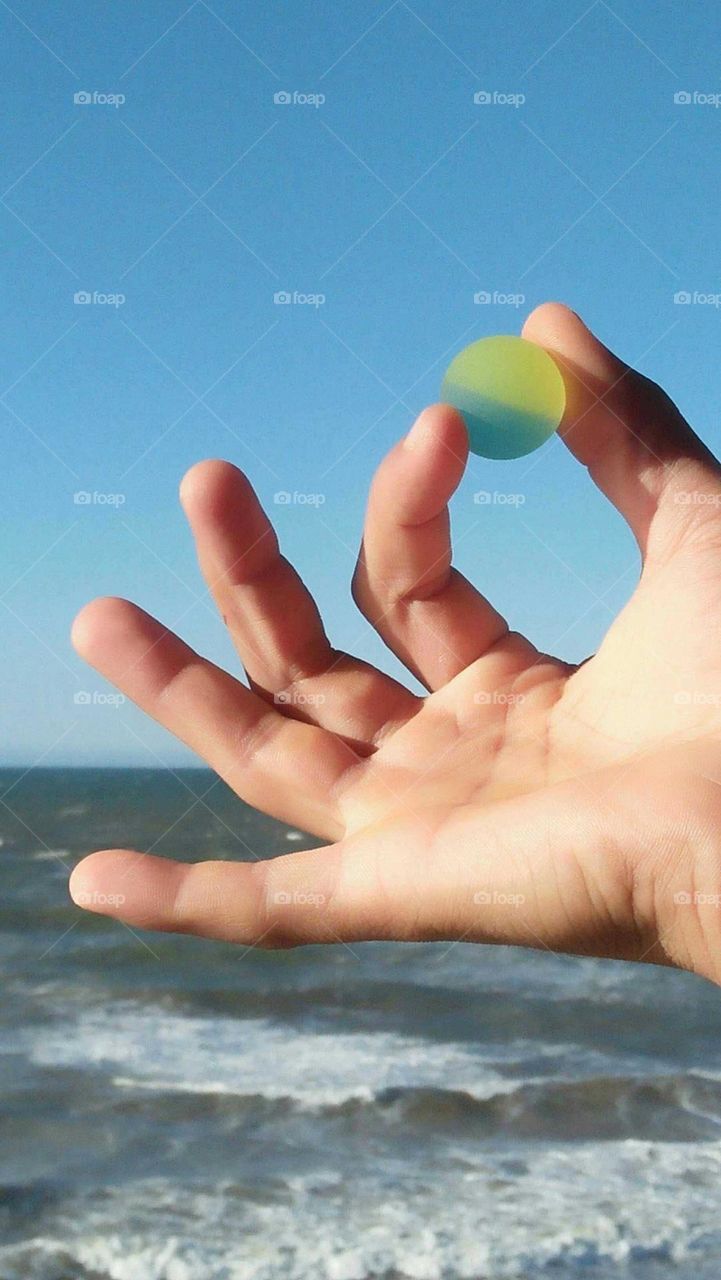 Beautiful multicolor sphere and beauty view to sea.