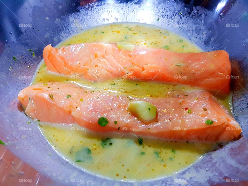 Italian salmon dinner preparation