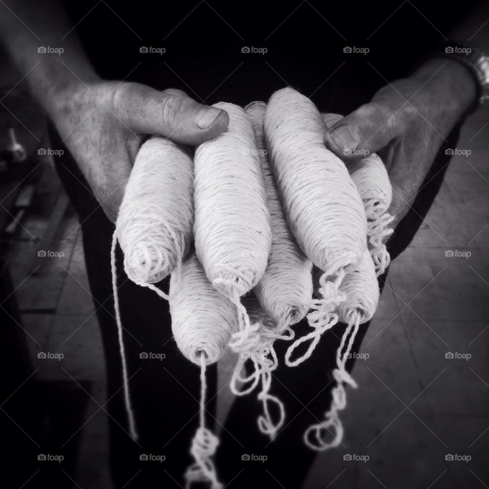 Hands holding yarn