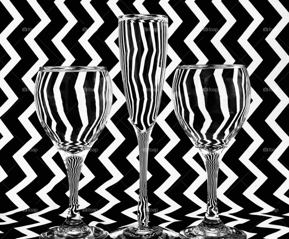 Composition, Rule of odds, patterns, black and white, wine glasses in front of a zigzag pattern