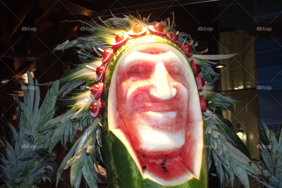 Watermelon Man. Carved watermelon of Native American Indian