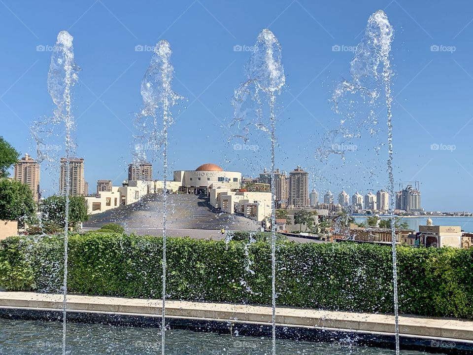 January 2020 Doha Qatar. Katara cultural centre view trough water fountain 